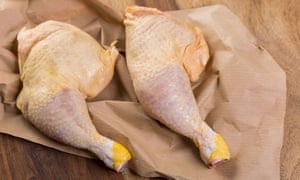 Two raw chicken legs.