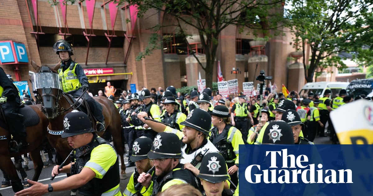Police clash with protesters at asylum hotel demonstrations across UK