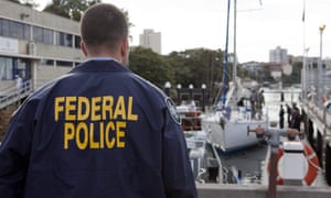 Australian Federal police guard a yacht