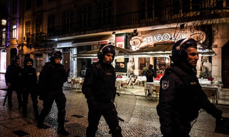Lisbon police officers on patrol on after clashes during a demonstration against racism and police violence. 