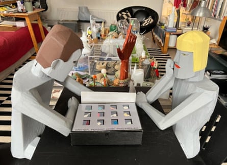 Cardboard figures play Critical Pursuit Home Analyses Kit by Madelon Vriesendorp.