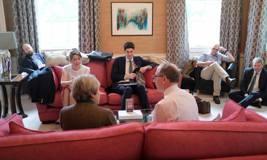 Theresa May with her husband Philip and advisers in their 10th floor, in the middle of a decoration discarded as