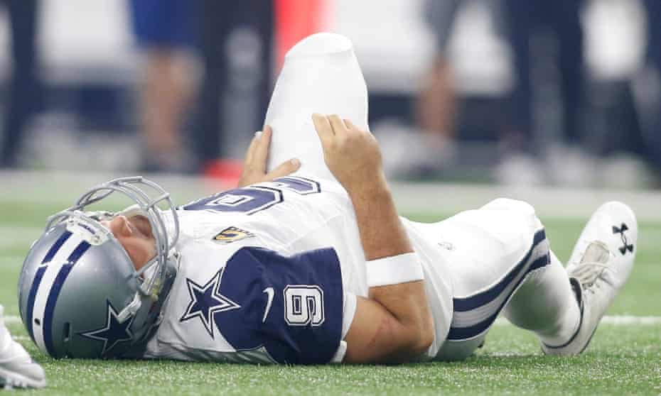 tony romo injured as panthers beat cowboys to move to 11 0 nfl the guardian