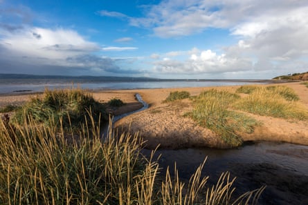 Rolling dunes and sea grasses at Thurstaston beach.