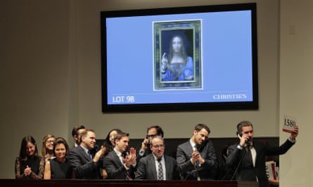 Bidding representatives react after Leonardo da Vinci’s Salvator Mundi sells.