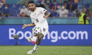 Lorenzo Insigne curls in Italy’s third goal.