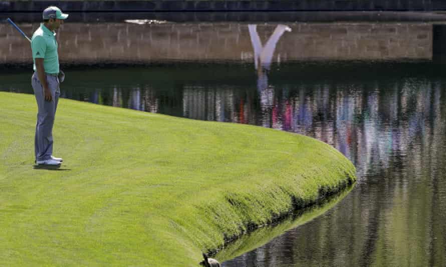 Sergio García looks out over the water on the 15th during his first round at the 2018 Masters