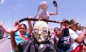 Aliens join the 2000 festival in Roswell, New Mexico, which celebrates the 1947 crashed balloon, first passed off by the army as a UFO.