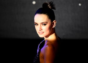 Daisy Ridley is caught in the spotlight on the red carpet