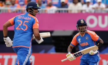 Suryakumar Yadav (right) and Shivam Dube run between the wickets to add to India’s total in their T20 World Cup match against the United States.