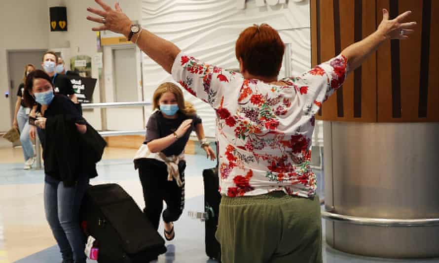 Bette-May Waine, right, welcomes family from Australia at Auckland international airport.