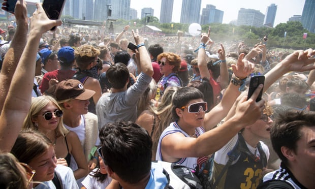 Fans were tightly packed and generally unmasked at the Lollapalooza Music Festival, at Grant Park in Chicago. 