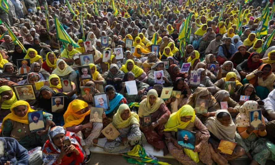 Women, including widows and relatives of farmers believed to have killed themselves over debt, protest against farm bills passed by India’s parliament, at Tikri border near Delhi.
