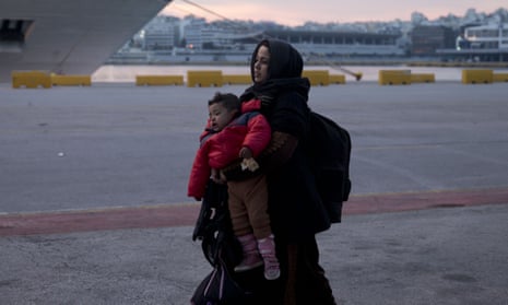 An Afghan woman arriving with her child in Athens’ main port of Piraeus last week. 