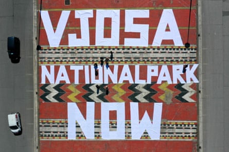 Aerial view of a slogan written by campaigners in Mother Theresa square, Tirana, supporting the Vjosa wild river national park, March 2021.