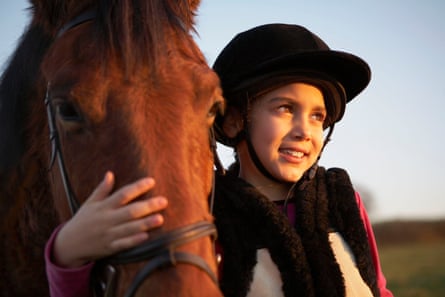 Horse bonding includes mucking out, grooming and riding.