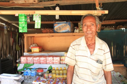 Floriano de Costa Marques, a professed former guerrilla fighter, at his roadside stall in Liquica.