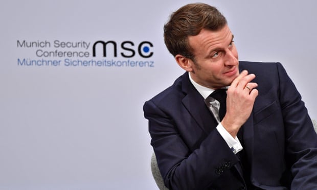 Emmanuel Macron gestures as he speaks at the 56th Munich Security Conference.
