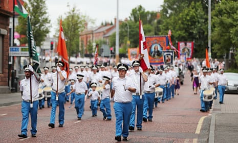 Orange Order members take part in a Twelfth of July parade in Belfast