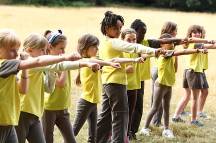 ‘The scout movement has moved with the times, and they’re quite hip now’ … Brownies exercising.