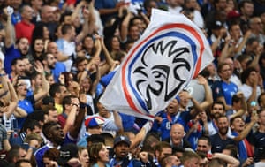 French supporters cheer for their team during the match between France and England, which saw an early goal from Harry Kane.