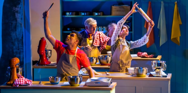 Contestants raise wooden spoons and rolling pins in Great British Bake‑Off: The Musical.