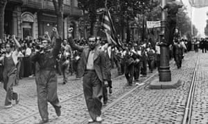 Republican supporters march through Barcelona in July 1936