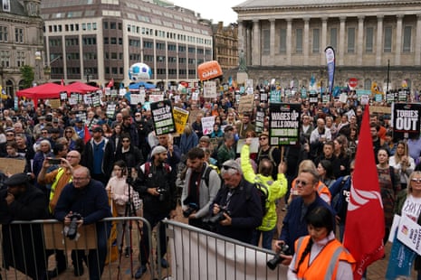 Anti-Tory protesters in Victoria Square in Birmingham, near the party conference venue.