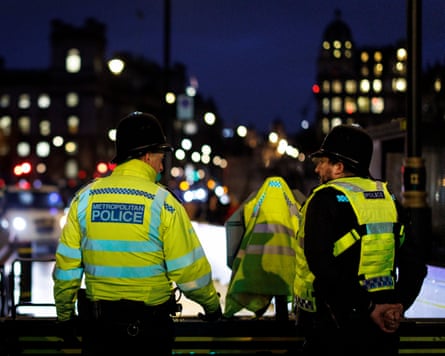 London Metropolitan police officers patrol outside the Houses of Parliament in January this year.