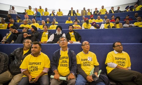 Taxi drivers and anti-Uber protesters at Toronto city hall