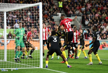 Jaidon Anthony rises to score for Brentford with a header.