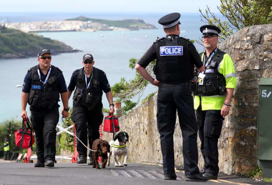 Police officers near the Carbis Bay Hotel