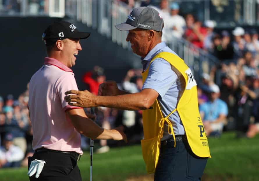 Justin Thomas of the United States reacts to his winning putt.