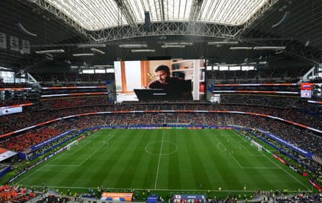 David Beckham in an advert on the big screen during half-time at the Netherlands v Japan game.