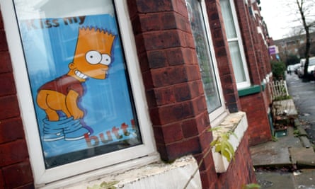 A poster of Bart Simpson with his trousers down in a window