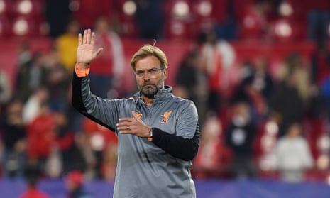 Jürgen Klopp of Liverpool shows his appreciation to the fans at the end of their Champions League draw at Sevilla, where they had lead 3-0 at half-time