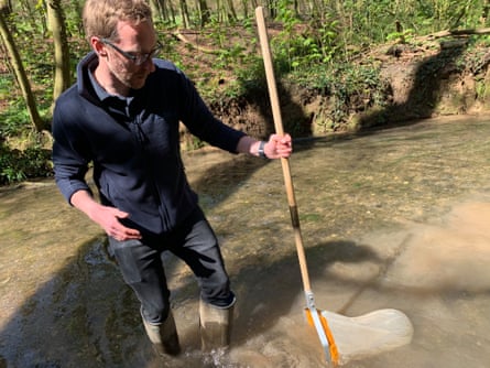Lincolnshire chalk streams project officer Will Bartle demonstrates his churning skills in the Lud.