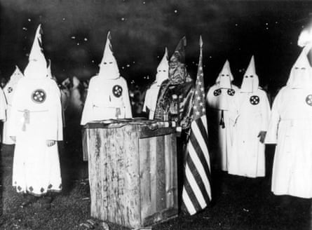 Nearly 30,000 Ku Klux Klan members meet at a night rally in Chicago, circa 1920.