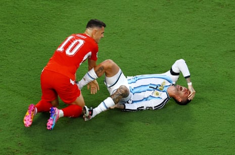 De Paul reacts after being fouled by Switzerland's Granit Xhaka
