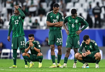 Dejection for Saudi Arabia players after their defeat by South Korea.
