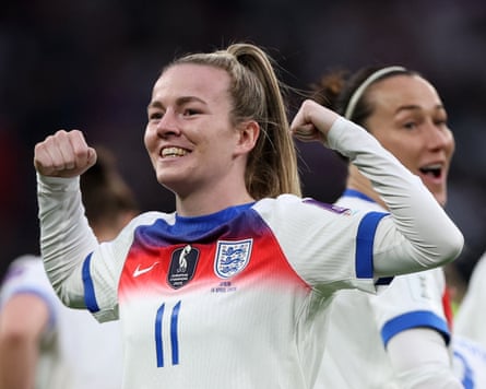 England's Lauren Hemp celebrates scoring their first goal.