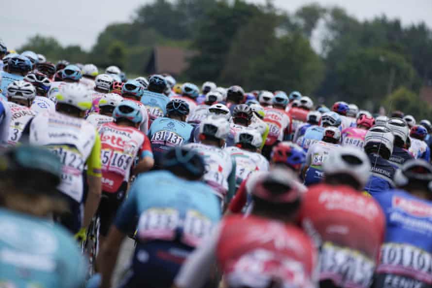 The peloton rides on stage five.