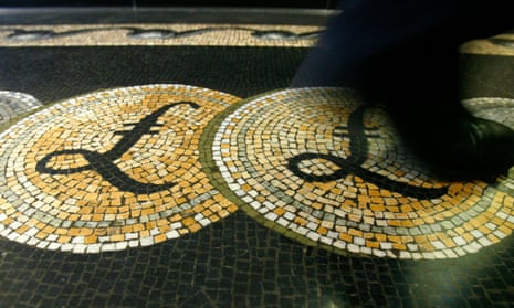 A mosaic incorporating pound symbols on the floor of the front hall of the Bank of England in London.
