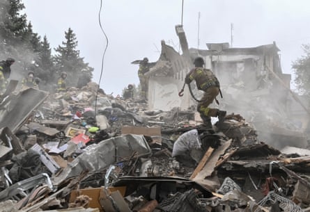 Rescuers working at the site of an apartment building damaged by a Russian strike in Zaporizhzhia.
