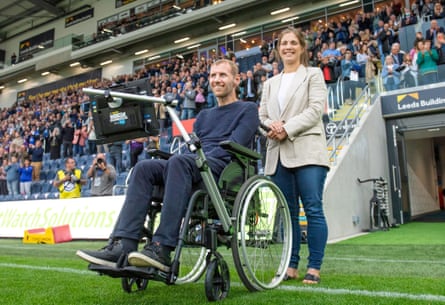 Lindsey and Rob Burrow are pitchside before a Leeds Rhinos match.