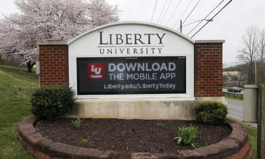 A sign marks the entrance to Liberty University.