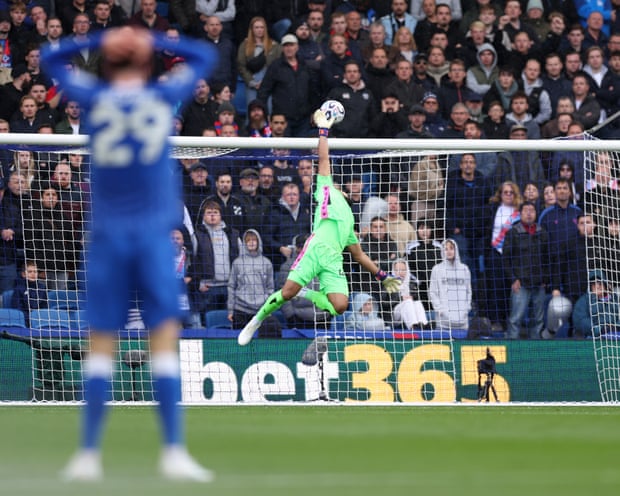 Crystal Palace's Walter Benítez tries to stop Diego Gómez’s halfway-line shot