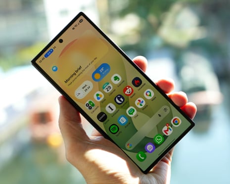 A hand holds a Samsung Galaxy Z Fold 8 Ultra smartphone showing its closed home screen with app icons.