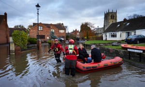 Emergency services rescue residents in Fishlake, South Yorkshire, after the village was flooded