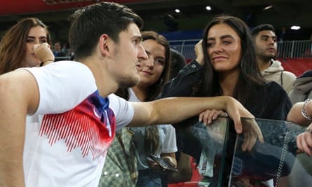 Harry Maguire talks to female fans at the World Cup.